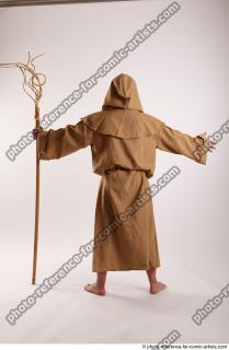 05 2019 01 JOEL ADAMSON MONK STANDING POSE WITH A…